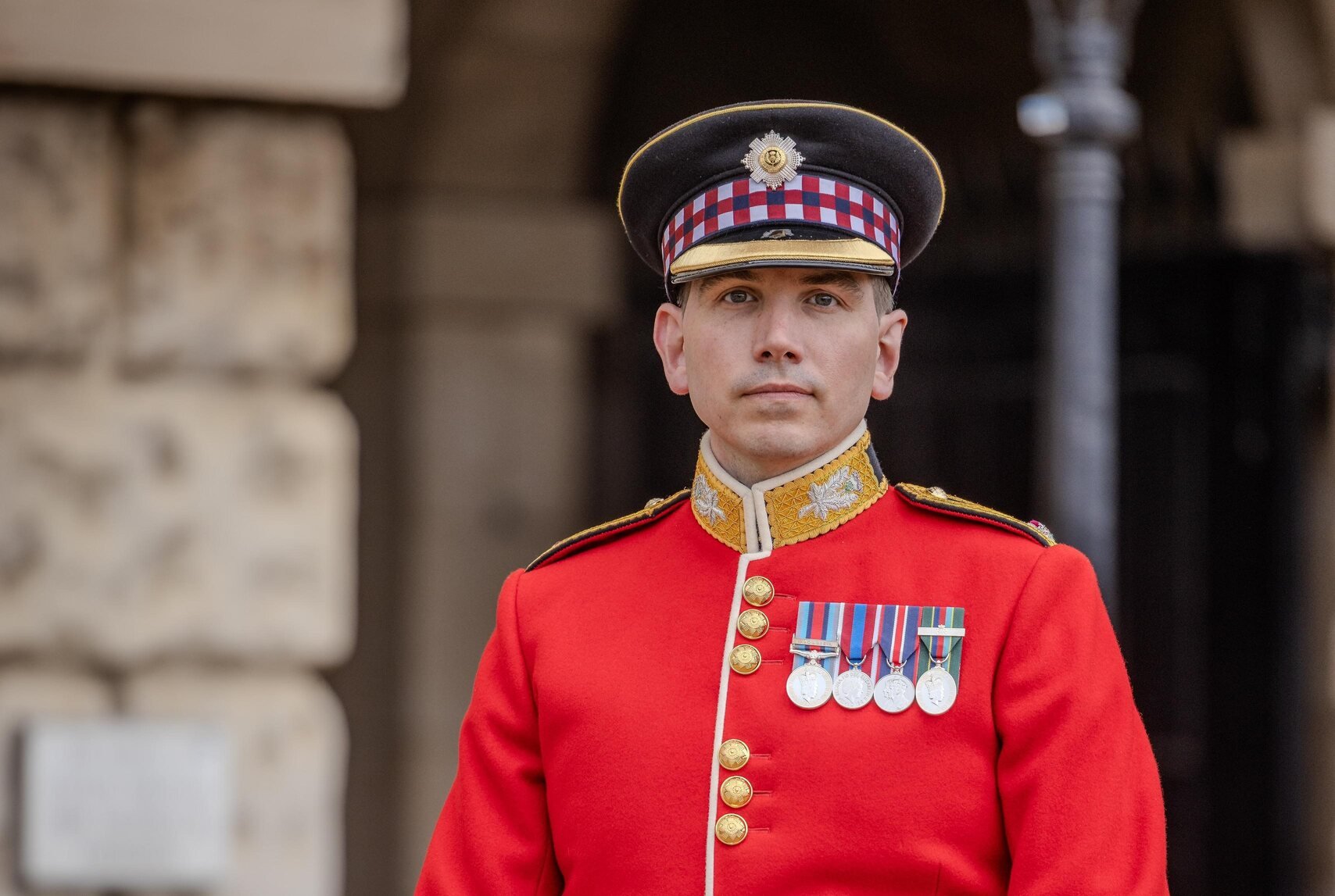 An army reservist is photographed taking part in the Trooping of the Colour.